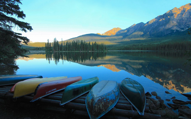 Canoes dock lake mountains forest free wallpaper for desktop - medium preview image