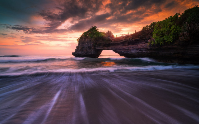 Ocean rock sunset waves person free wallpaper for desktop - medium preview image