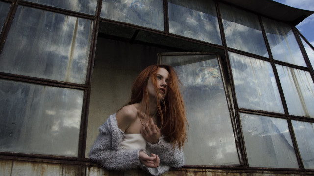 Woman redhair window sky clouds free wallpaper for desktop - medium preview image