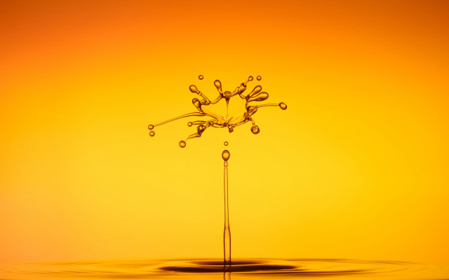 Water drop puddle yellow background free wallpaper for desktop - medium preview image