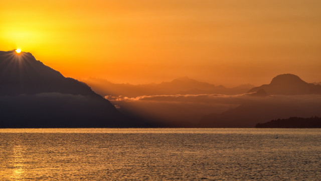 Sunset mountain water boat sky free wallpaper for desktop - medium preview image