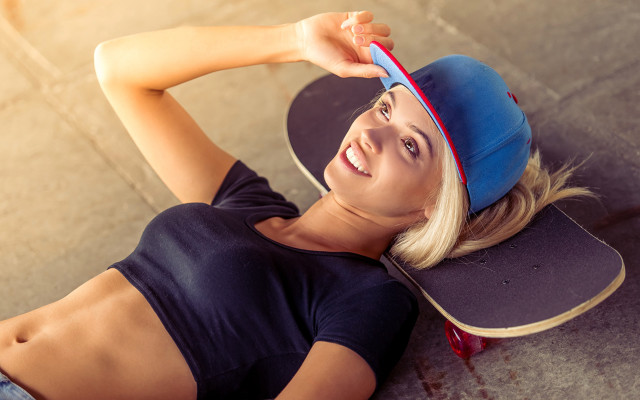 Woman skateboard hat blonde ponytail free wallpaper for desktop - medium preview image