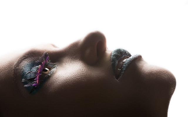 Woman feather face closed tilted free wallpaper for desktop - medium preview image