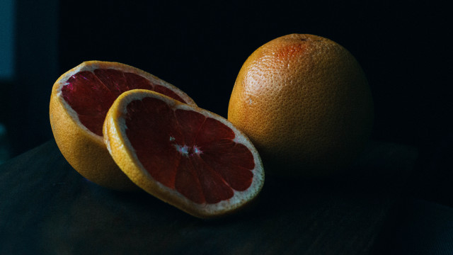 Grapefruits stilllife minimalism orange black free wallpaper for desktop - medium preview image