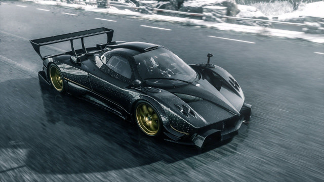 Black race car snow road free wallpaper for desktop - medium preview image