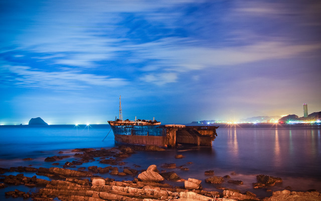 Boat water city night shore free wallpaper for desktop - medium preview image