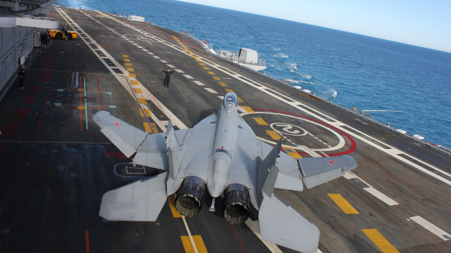 Fighter jet ship ocean puzzle free wallpaper for desktop - medium preview image