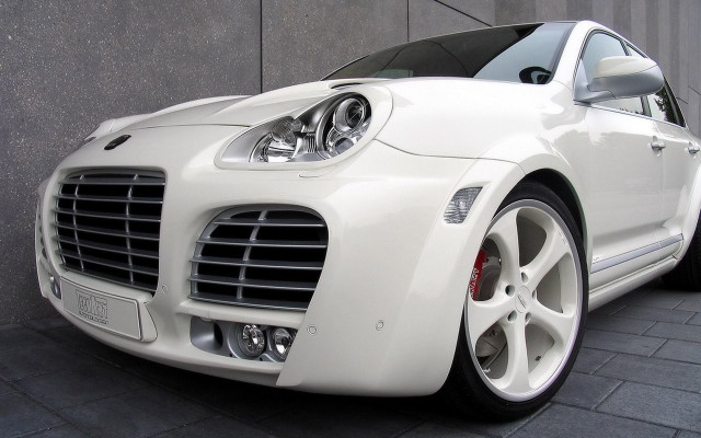 White sports car building night free wallpaper for desktop - medium preview image