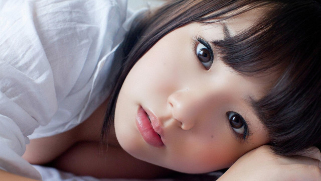 Young girl laying bed hands free wallpaper for desktop - medium preview image