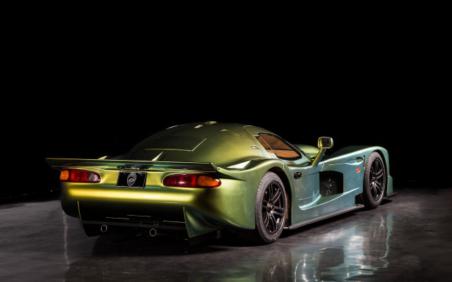 Green sports car dark room #4 free wallpaper for desktop - medium preview image