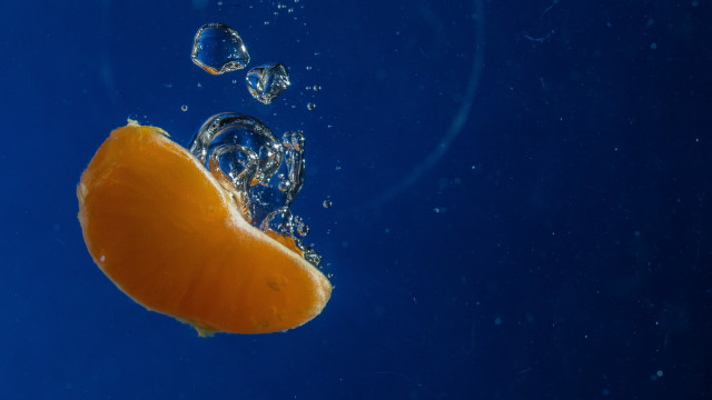 Orange floating bubbles blue background free wallpaper for desktop - medium preview image