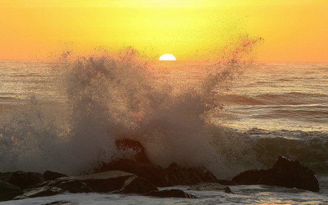 Crashing wave sunset rock ocean free wallpaper for desktop - medium preview image