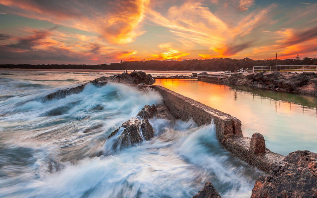 Sunset water waves rocks pier free wallpaper for desktop - medium preview image