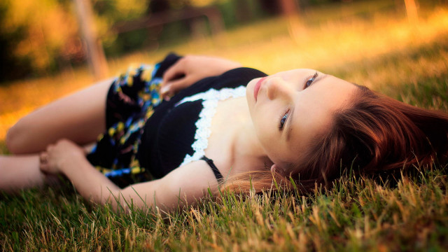 Woman laying grass blackwhite dress free wallpaper for desktop - medium preview image