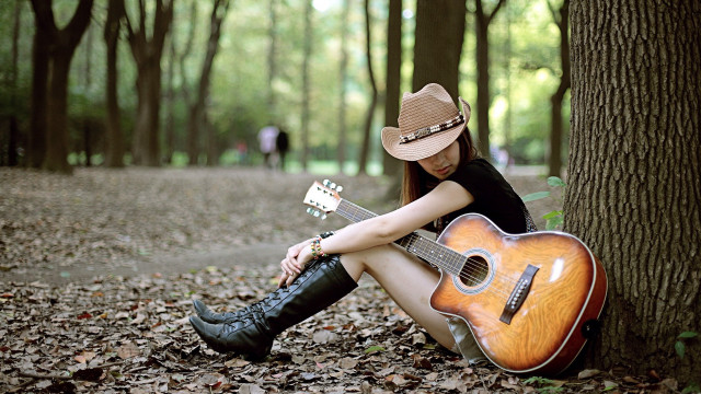 Woman sitting guitar cowboy hat free wallpaper for desktop - medium preview image