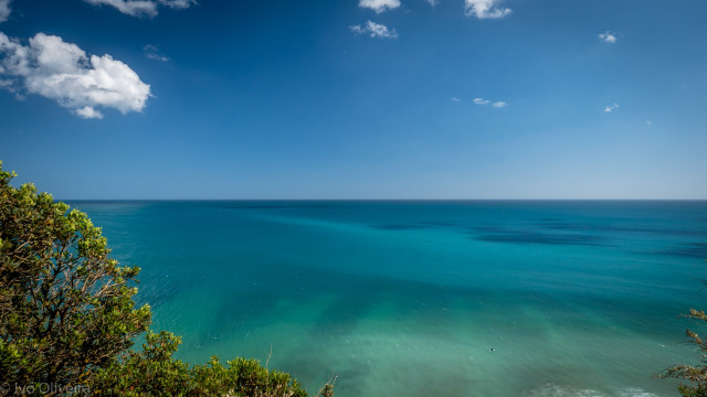 Ocean hilltop view blue sky free wallpaper for desktop - medium preview image