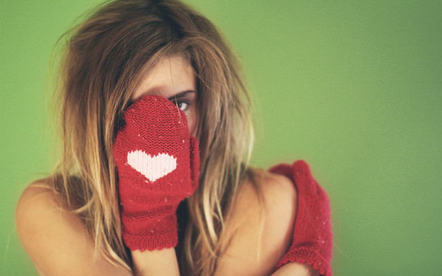 Woman heart mitt covering face free wallpaper for desktop - medium preview image