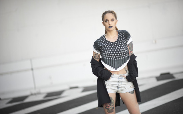 Tattooed woman streetcorner cellphone fashion free wallpaper for desktop - medium preview image