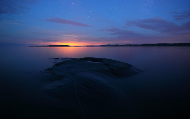 Boat water sunset city mountains free wallpaper for desktop - medium preview image