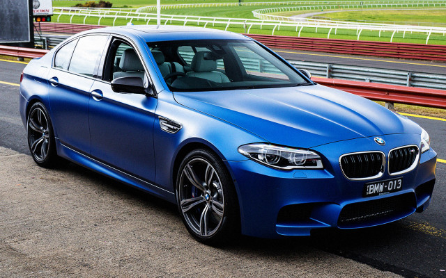 Blue bmw car race track free wallpaper for desktop - medium preview image