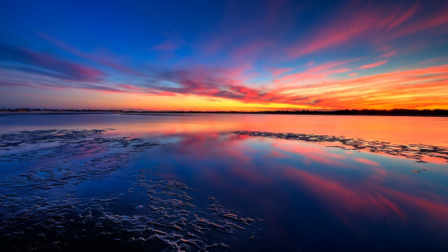 Sunset water clouds waves cityscape free wallpaper for desktop - medium preview image