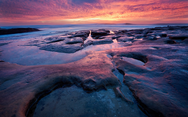 Sunset rocky beach ice water free wallpaper for desktop - medium preview image