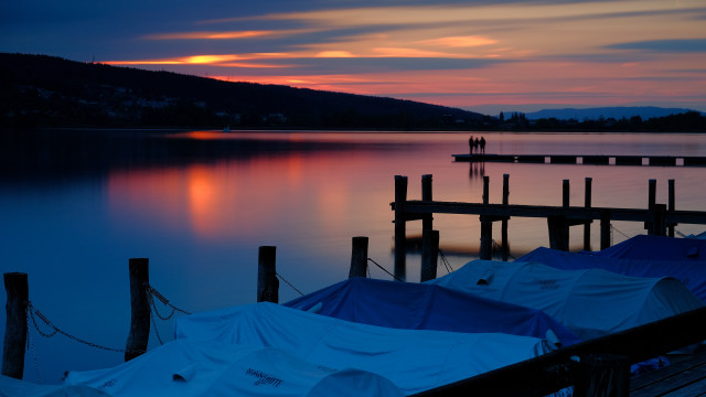 Dock tents sunset people mountains free wallpaper for desktop - medium preview image