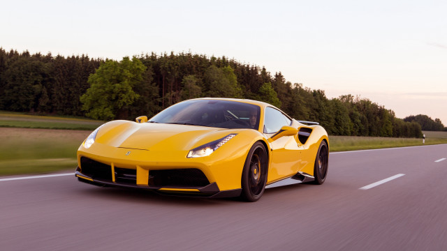 Yellow sports car driving forest free wallpaper for desktop - medium preview image
