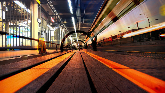 Train cityscape night motion blur free wallpaper for desktop - medium preview image