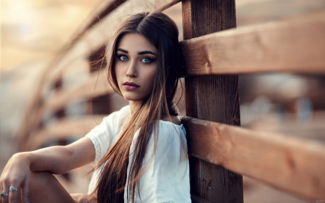 Woman leaning fence blueeyes longhair free wallpaper for desktop - medium preview image