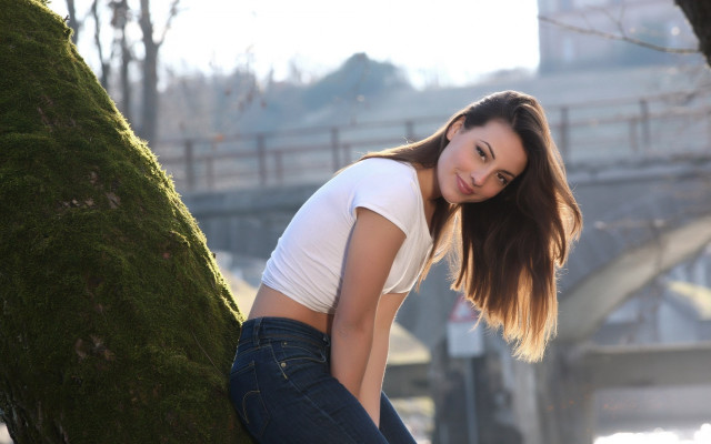 Woman leaning tree bridge outdoors free wallpaper for desktop - medium preview image