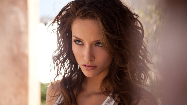 Woman longhair whiteshirt wind portrait free wallpaper for desktop - medium preview image