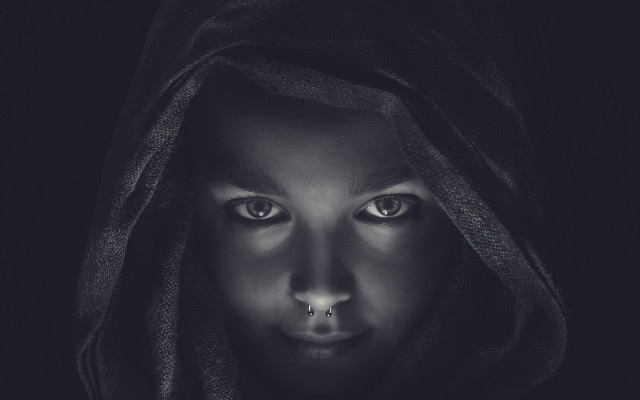Creepy hooded woman nose piercing free wallpaper for desktop - medium preview image