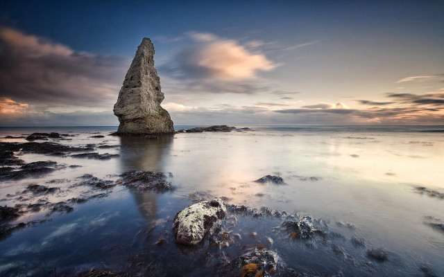 Rock water sunset beach cloudy free wallpaper for desktop - medium preview image