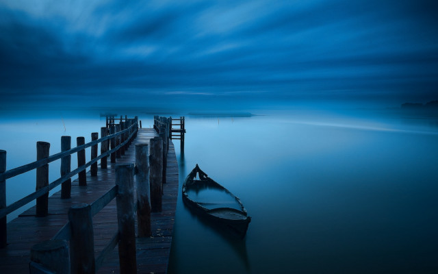 Docked boat lake night cloudy free wallpaper for desktop - medium preview image