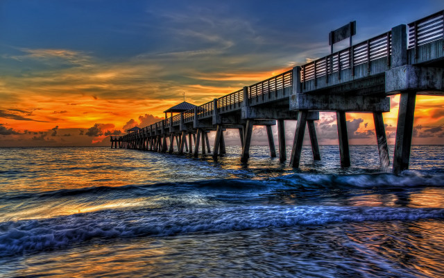 Sunset pier ocean waves beach free wallpaper for desktop - medium preview image