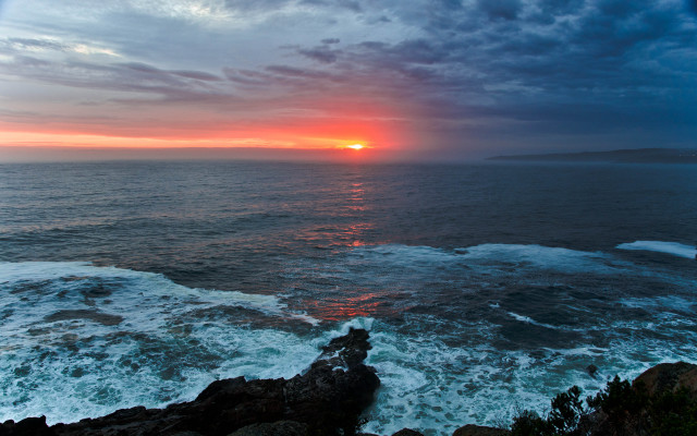 Sunset ocean waves cliff reflection free wallpaper for desktop - medium preview image