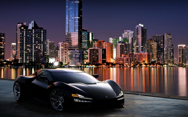 Black sports car tokyo cityscape free wallpaper for desktop - medium preview image