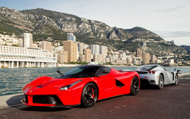 Red sports cars cityscape mountains free wallpaper for desktop - medium preview image