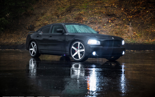 Black car wet road hillside free wallpaper for desktop - medium preview image