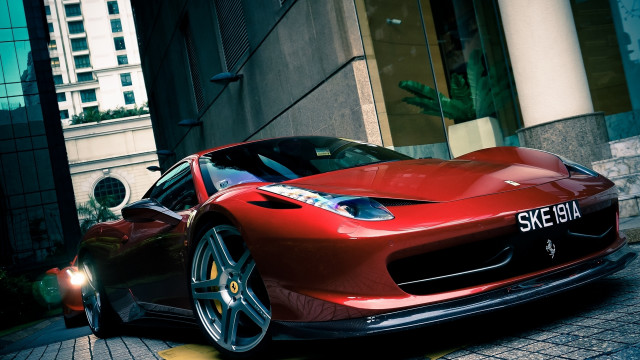 Red sports car city clock free wallpaper for desktop - medium preview image