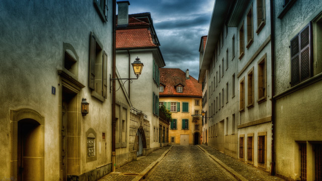 Narrow street lamp post cobblestone free wallpaper for desktop - medium preview image