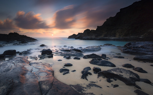 Beach rocks water sunset cloudy free wallpaper for desktop - medium preview image