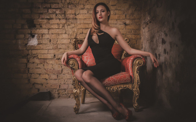 Woman black dress red chair free wallpaper for desktop - medium preview image