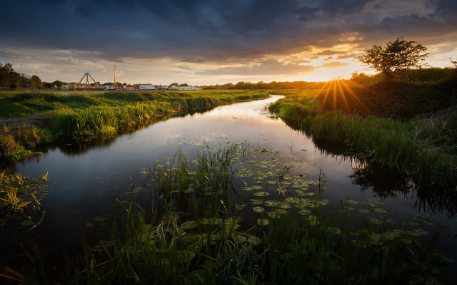 River bridge sunset clouds green free wallpaper for desktop - medium preview image
