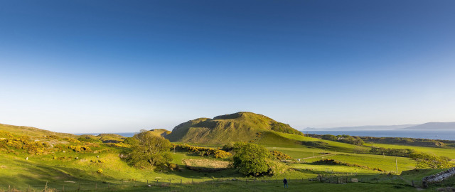 Grassy hill lake blue sky free wallpaper for desktop - medium preview image