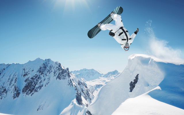 Snowboarder mountain sky sun winter free wallpaper for desktop - medium preview image