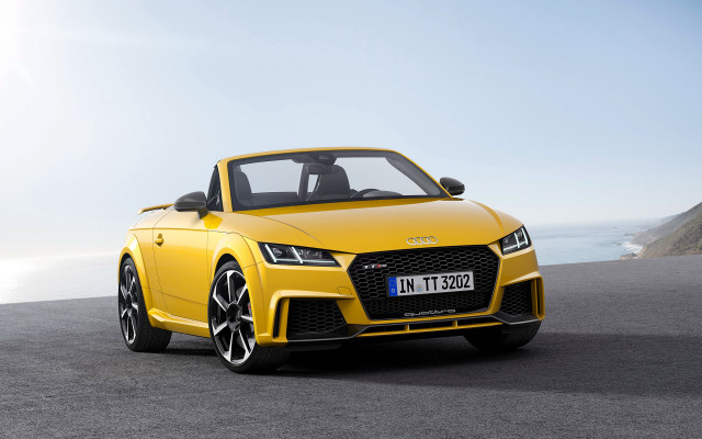 Yellow sports car ocean cliff free wallpaper for desktop - medium preview image