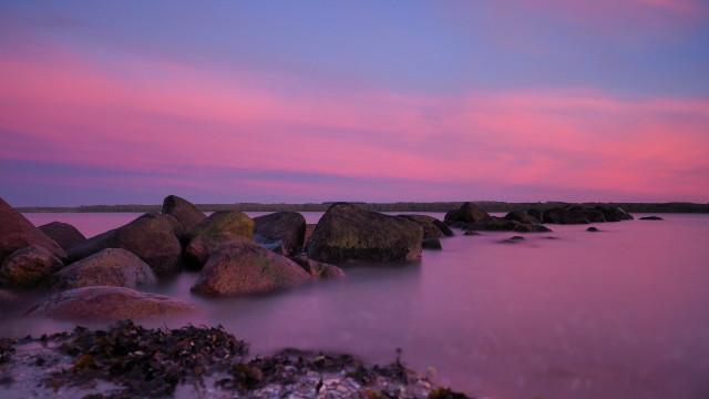 Pink sky water rocks mountains free wallpaper for desktop - medium preview image