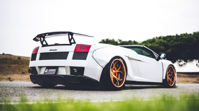 White sports car roof rack free wallpaper for desktop - medium preview image